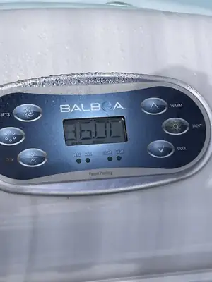 A Balboa hot tub control panel showing the water temperature