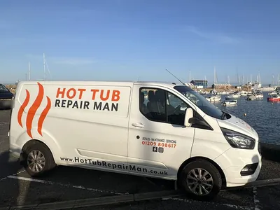 Hot Tub Repair Man van parked by a Cornish harbour