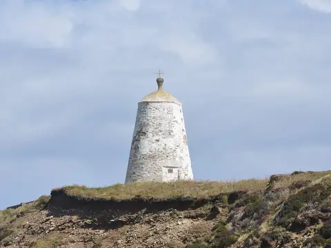 The Pepperpot, a round white daymark on the cliff top above Portreath