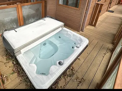 Hot tub on the timber deck of a lodge