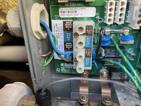 Wiring terminals inside an opened hot tub control box
